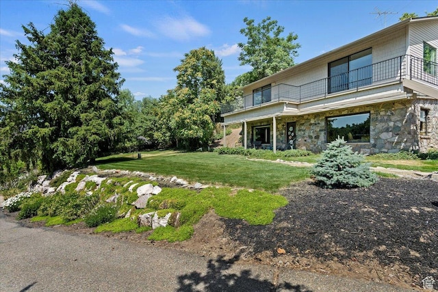2391 Kays Creek Dr, Layton, UT 84040 - view of grassy yard with a balcony