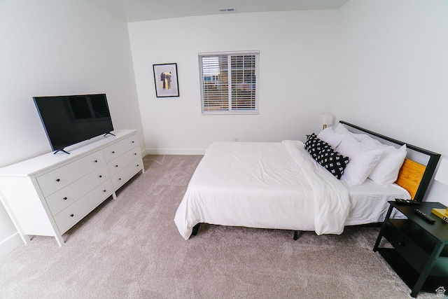 357 W Posies Dr, Garden City, UT 84028 - bedroom with light colored carpet and baseboards