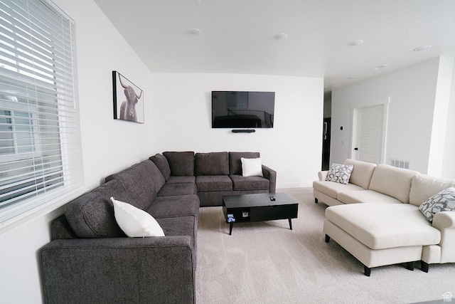 357 W Posies Dr, Garden City, UT 84028 - living area featuring carpet flooring and healthy amount of natural light
