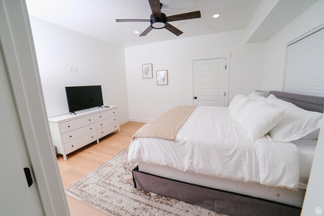 357 W Posies Dr, Garden City, UT 84028 - bedroom with light wood finished floors, recessed lighting, and a ceiling fan