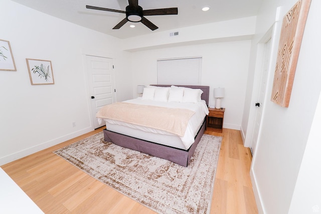 357 W Posies Dr, Garden City, UT 84028 - bedroom with light wood-style flooring, a closet, recessed lighting, and ceiling fan