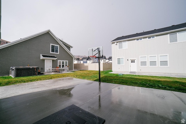 357 W Posies Dr, Garden City, UT 84028 - view of basketball court with a lawn
