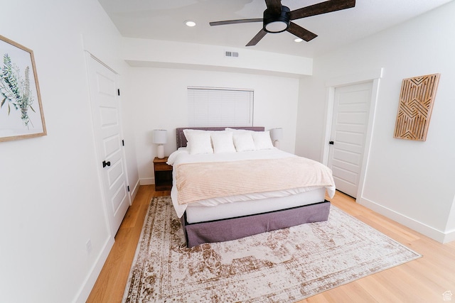 357 W Posies Dr, Garden City, UT 84028 - bedroom with light wood finished floors, recessed lighting, and ceiling fan