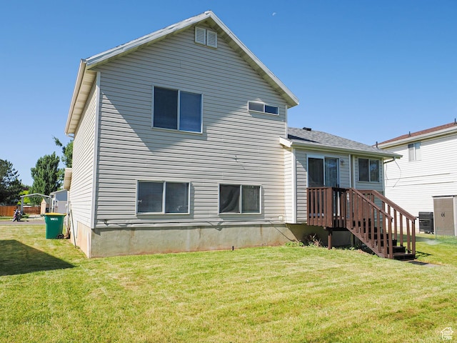 136 W 1980 S, Clearfield, UT 84015 - rear view of property featuring a lawn