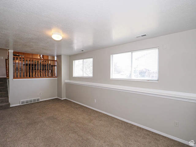 136 W 1980 S, Clearfield, UT 84015 - empty room featuring carpet floors, stairway, and a textured ceiling