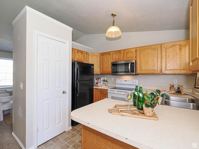 136 W 1980 S, Clearfield, UT 84015 - kitchen featuring stainless steel microwave, electric range, freestanding refrigerator, lofted ceiling, and light countertops