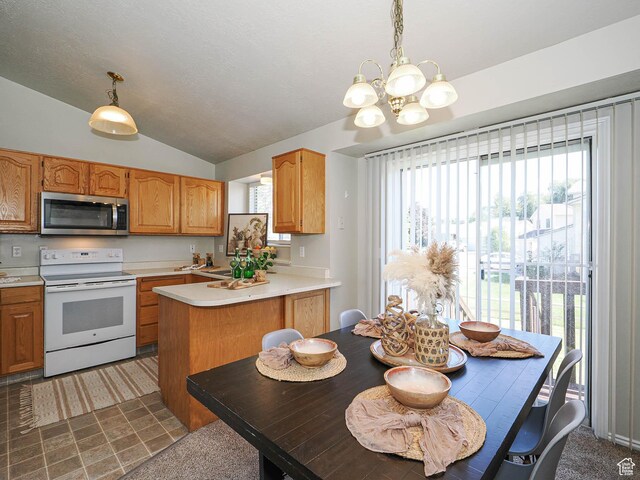 136 W 1980 S, Clearfield, UT 84015 - kitchen featuring stainless steel microwave, white electric range oven, a chandelier, vaulted ceiling, and light countertops