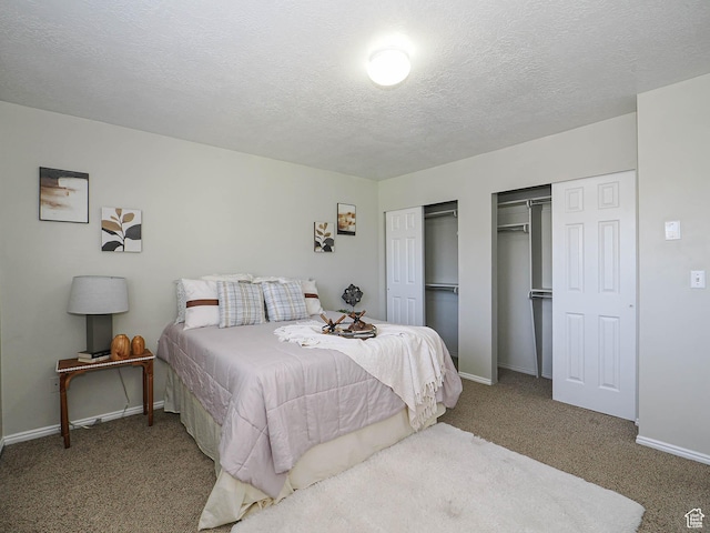 136 W 1980 S, Clearfield, UT 84015 - carpeted bedroom featuring multiple closets and a textured ceiling