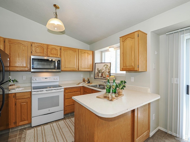 136 W 1980 S, Clearfield, UT 84015 - kitchen featuring stainless steel microwave, electric range, lofted ceiling, a peninsula, and light countertops