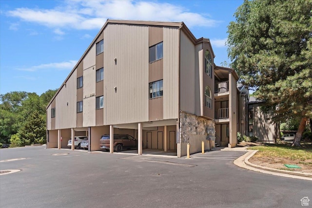 1175 E Canyon Rd Unit 83, Ogden, UT 84404 - view of building exterior featuring covered parking