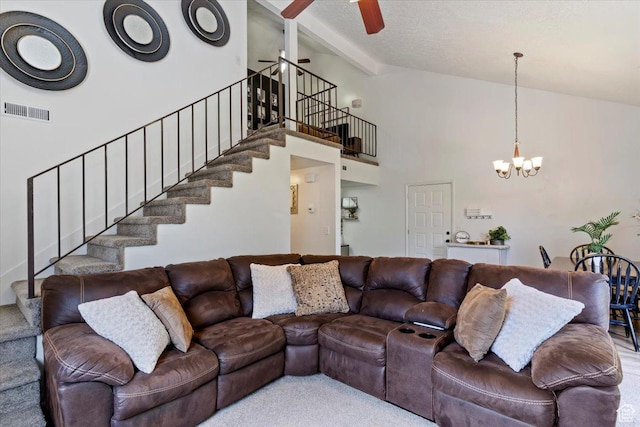 1175 E Canyon Rd Unit 83, Ogden, UT 84404 - living room with stairway, a ceiling fan, a chandelier, beamed ceiling, and high vaulted ceiling