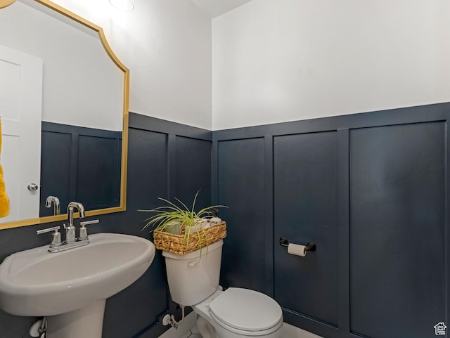 3187 N 3450 W, Plain City, UT 84404 - half bath featuring a decorative wall and a wainscoted wall