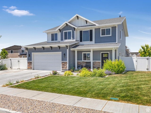3187 N 3450 W, Plain City, UT 84404 - craftsman-style home with a gate, covered porch, driveway, and board and batten siding