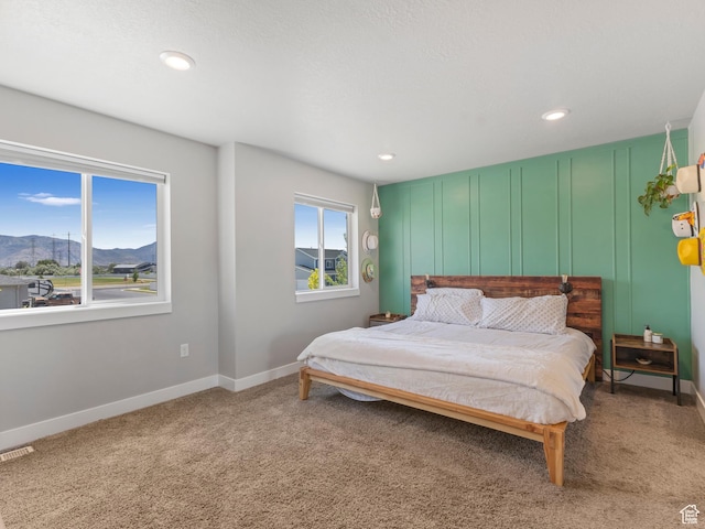 3187 N 3450 W, Plain City, UT 84404 - carpeted bedroom featuring a mountain view and recessed lighting