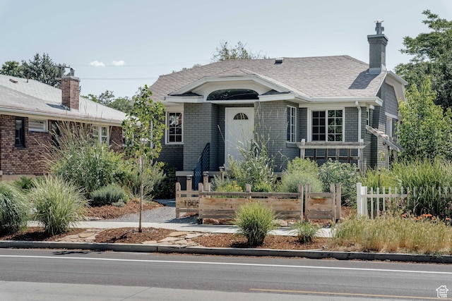 1805 S 500 E, Salt Lake City, UT 84105 - view of front facade featuring a chimney and brick siding