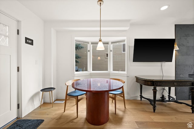 1492 Meadow Rd, Snyderville, UT 84098 - dining room with wood finished floors and recessed lighting