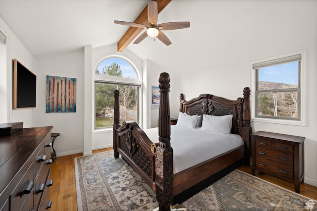 1492 Meadow Rd, Snyderville, UT 84098 - bedroom with multiple windows, light wood-style flooring, and ceiling fan