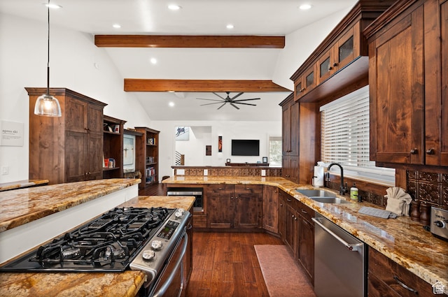 1492 Meadow Rd, Snyderville, UT 84098 - kitchen featuring stainless steel dishwasher, range with gas cooktop, dark wood-style flooring, light stone countertops, and glass insert cabinets