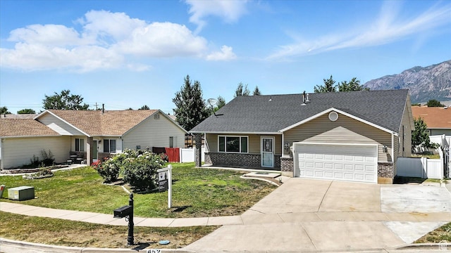 452 E 875 N, Ogden, UT 84404 - view of front of house with a garage, concrete driveway, brick siding, a shingled roof, and a gate