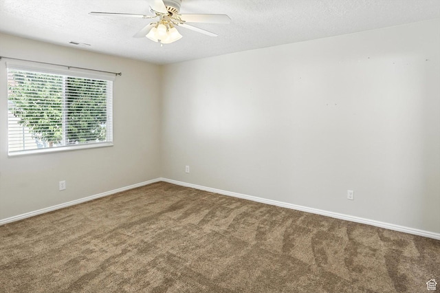 452 E 875 N, Ogden, UT 84404 - spare room featuring carpet floors, a textured ceiling, and ceiling fan