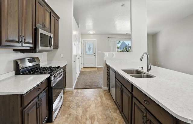 452 E 875 N, Ogden, UT 84404 - kitchen with stainless steel appliances and dark brown cabinetry