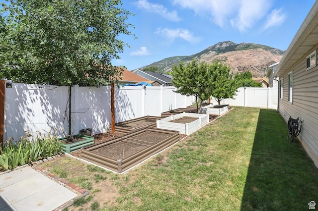 452 E 875 N, Ogden, UT 84404 - fenced backyard featuring a garden and a mountain view