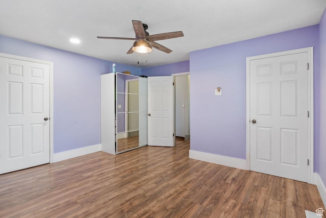 632 S 1150 W, Layton, UT 84041 - unfurnished bedroom featuring wood finished floors, a ceiling fan, and recessed lighting