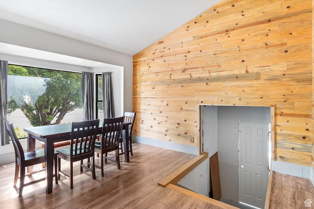 632 S 1150 W, Layton, UT 84041 - dining room with lofted ceiling, wood walls, and wood finished floors