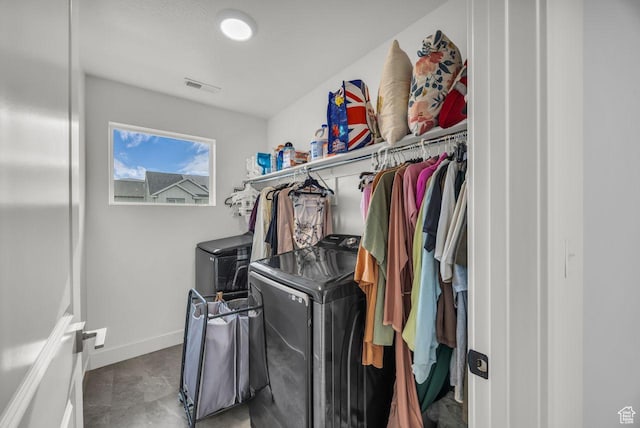 12357 S Eovaldi Ave, Herriman, UT 84096 - washroom featuring washing machine and dryer and baseboards