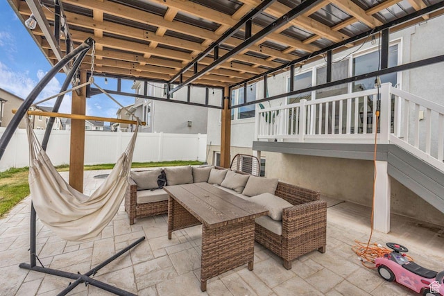 12357 S Eovaldi Ave, Herriman, UT 84096 - fenced backyard featuring a patio area, outdoor lounge area, and stairs
