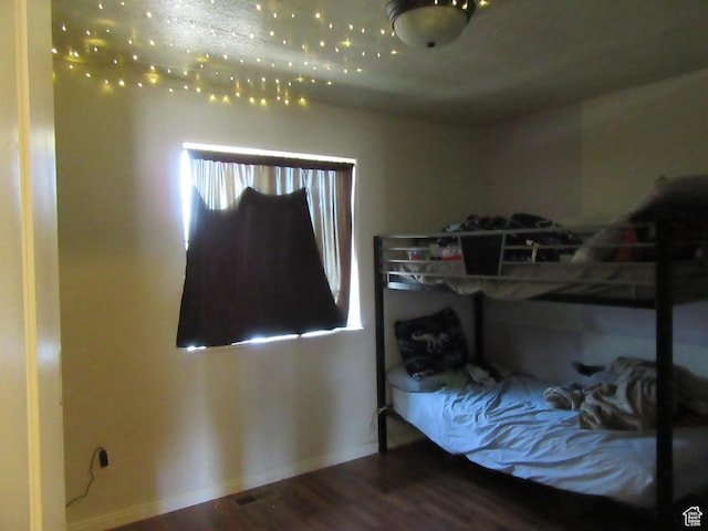 544 E 1875 S, Roosevelt, UT 84066 - bedroom featuring wood finished floors and baseboards