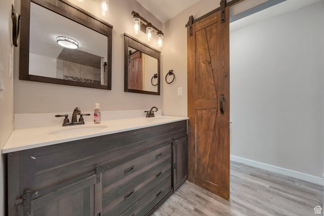 13155 S 3600 W, Riverton, UT 84065 - bathroom with double vanity and wood finished floors