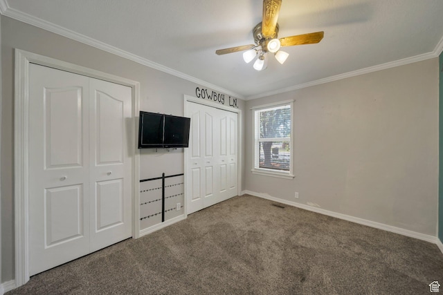 13155 S 3600 W, Riverton, UT 84065 - unfurnished bedroom featuring carpet floors, ornamental molding, multiple closets, and a ceiling fan