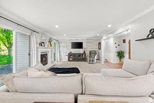 958 N Main St W, Farmington, UT 84025 - living room with a glass covered fireplace, crown molding, and recessed lighting