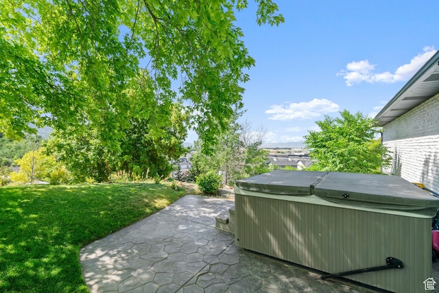 958 N Main St W, Farmington, UT 84025 - view of grassy yard with a hot tub and a patio