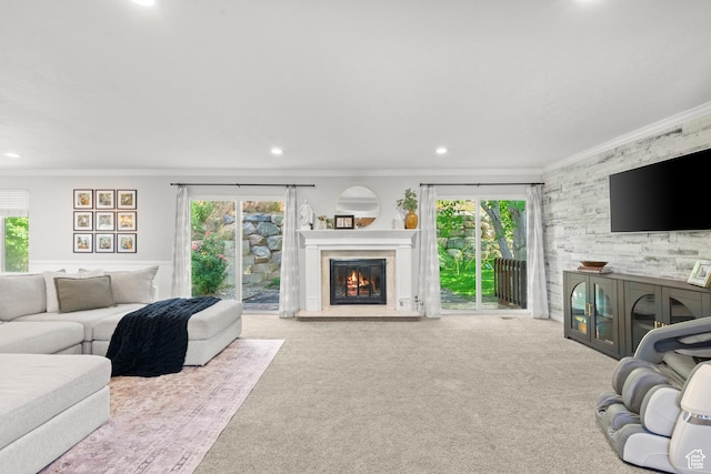 958 N Main St W, Farmington, UT 84025 - carpeted living area with a glass covered fireplace, ornamental molding, and recessed lighting