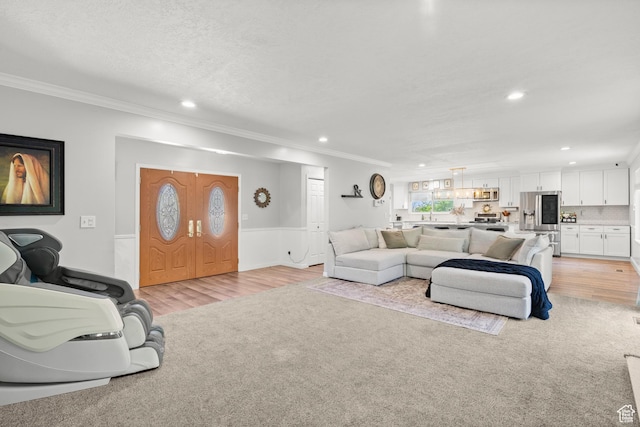 958 N Main St W, Farmington, UT 84025 - living room featuring crown molding, recessed lighting, and light wood-style floors