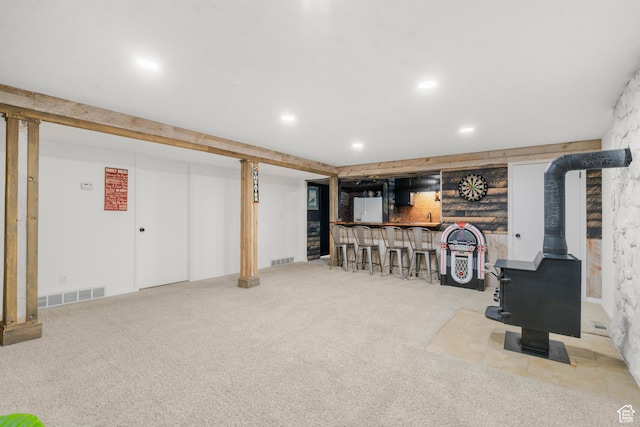 958 N Main St W, Farmington, UT 84025 - finished below grade area with carpet floors, bar area, a wood stove, and recessed lighting