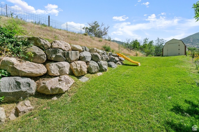 958 N Main St W, Farmington, UT 84025 - view of yard with a storage unit and a playground