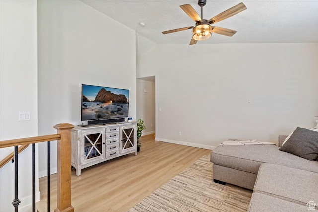 2876 S 1200 W, Syracuse, UT 84075 - living area featuring light wood-type flooring, ceiling fan, and vaulted ceiling