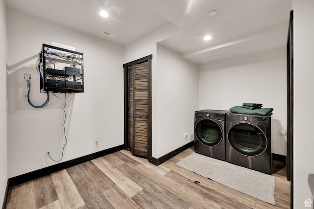 11301 E Marigold Ln Unit 1670, Heber City, UT 84032 - laundry area with washer and clothes dryer, wood finished floors, and recessed lighting
