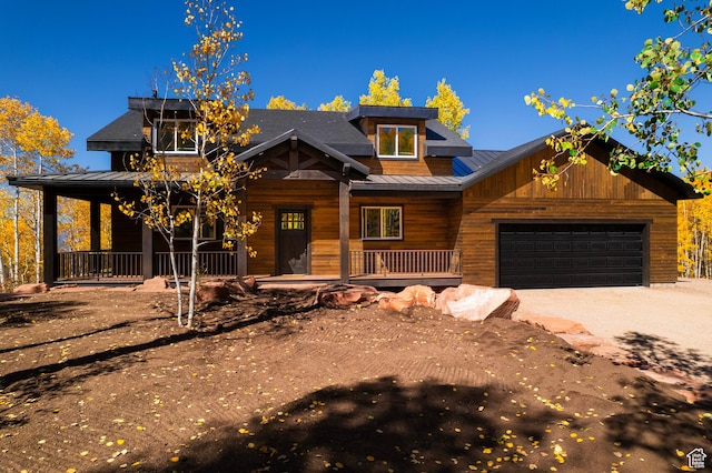 11301 E Marigold Ln Unit 1670, Heber City, UT 84032 - view of front of house featuring covered porch, a standing seam roof, a metal roof, a garage, and driveway