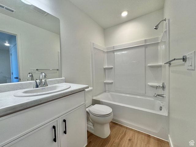 1650 N Main St N Unit 116, Layton, UT 84041 - full bath featuring wood finished floors, vanity, bathing tub / shower combination, and recessed lighting