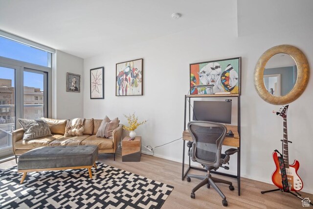 35 E 100 S Unit 708, Salt Lake City, UT 84111 - living room featuring wood finished floors and an office area