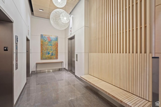 35 E 100 S Unit 708, Salt Lake City, UT 84111 - hall featuring elevator and a high ceiling