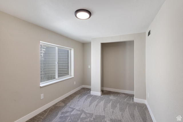 1919 E Church Way, Eagle Mountain, UT 84005 - unfurnished bedroom featuring carpet and a closet