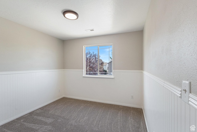1919 E Church Way, Eagle Mountain, UT 84005 - spare room with carpet flooring and wainscoting