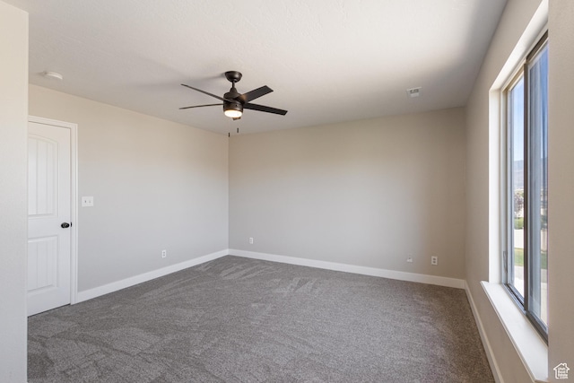 1919 E Church Way, Eagle Mountain, UT 84005 - empty room with ceiling fan, dark carpet, and a smoke detector