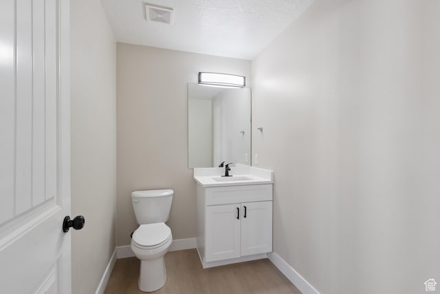 1919 E Church Way, Eagle Mountain, UT 84005 - half bathroom featuring wood finished floors and vanity