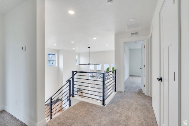 7625 N Silver Creek Way, Eagle Mountain, UT 84005 - hallway featuring an upstairs landing, light colored carpet, and recessed lighting